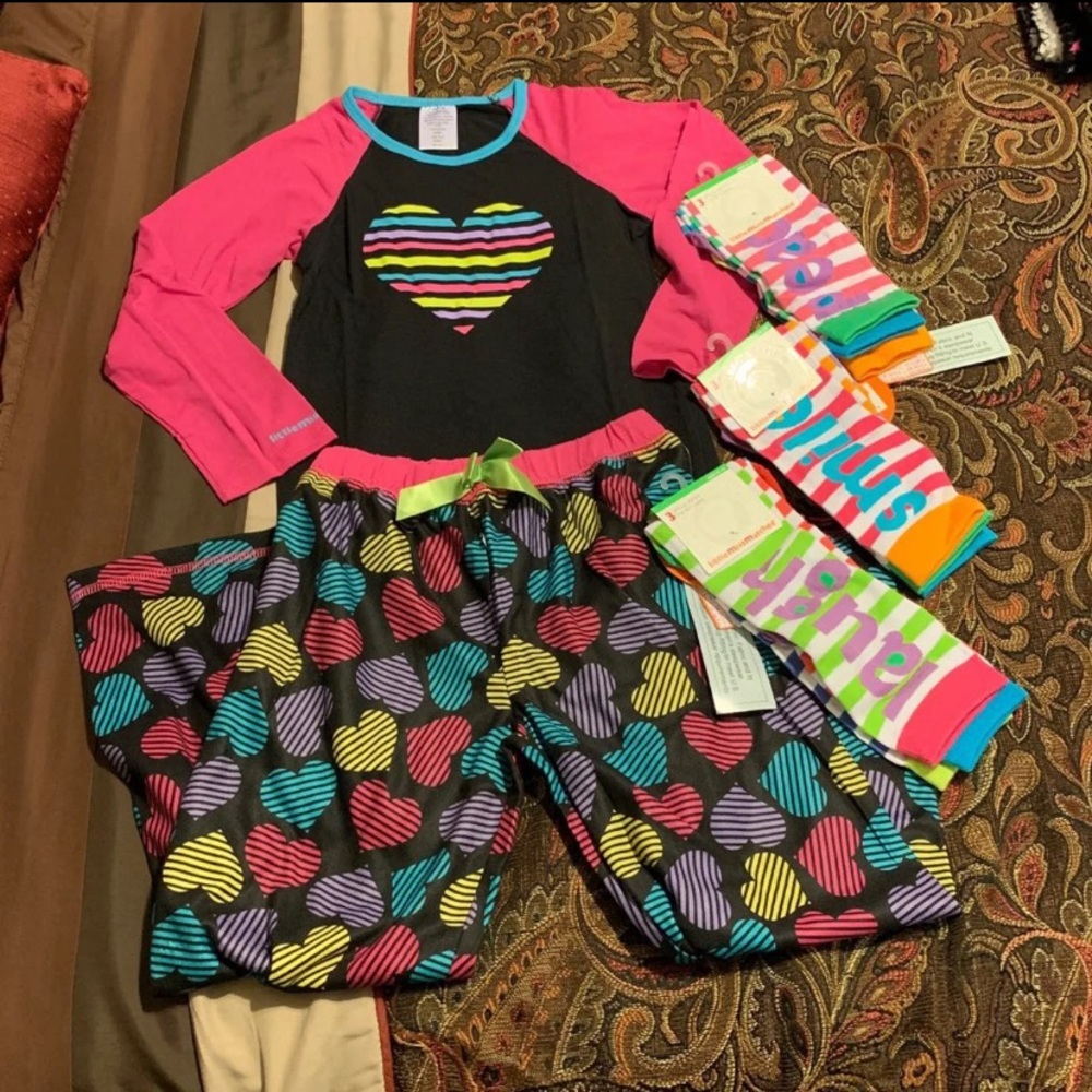 New bundle of pajamas set And 3packs (6) of socks.